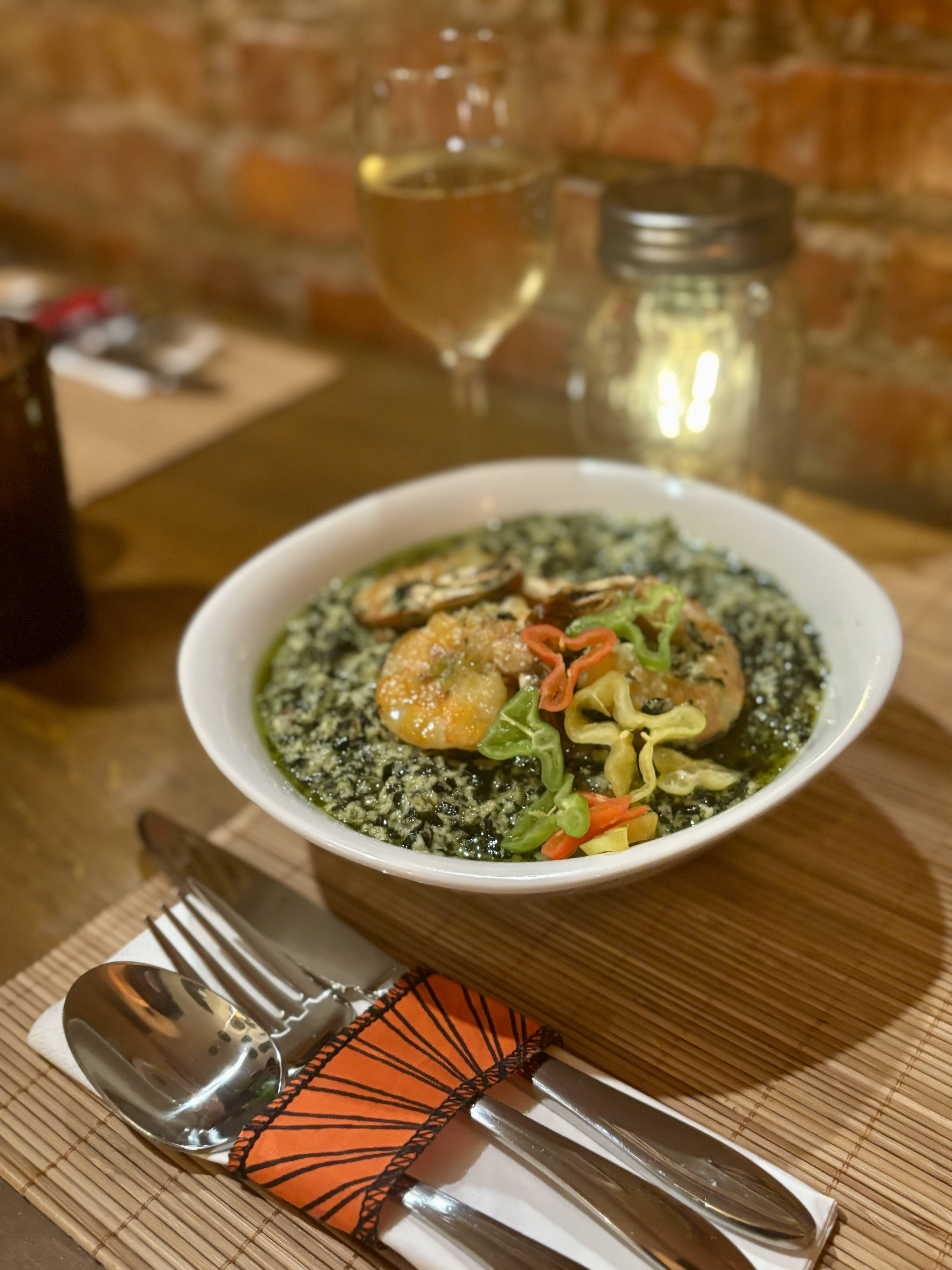 Ndolé - Cameroon's national dish of bitter greens with peanuts, aromatic spices, and tender meat